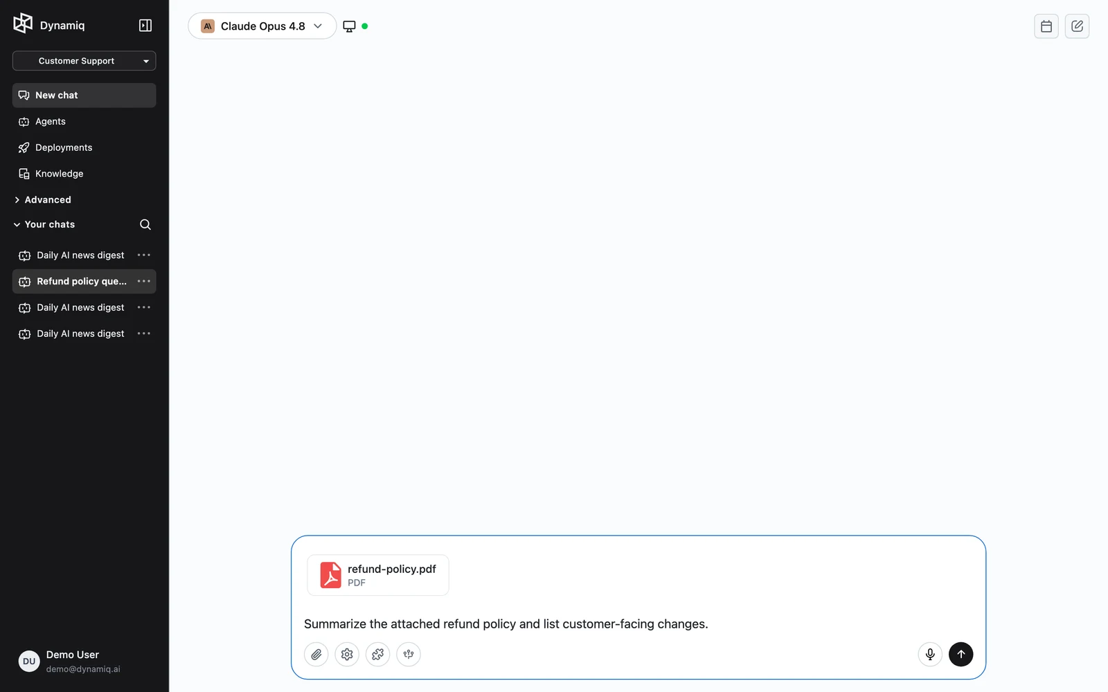 The chat input with attached file cards above it, one still uploading