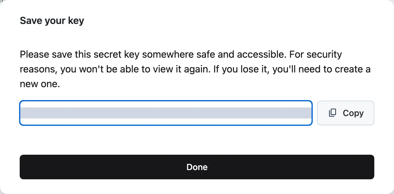 The Save your key dialog showing the full access key with a Copy button